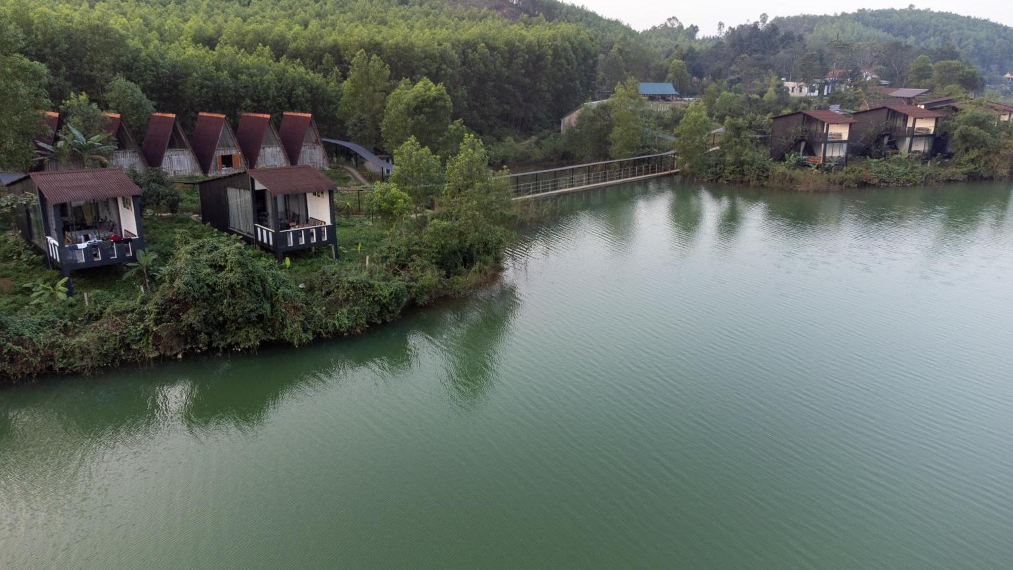 Nguyen Shack Retreat Resort Фонгня Экстерьер фото